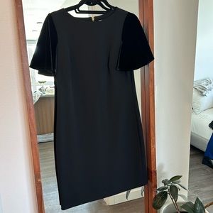 Black Calvin Klein dress with velvet sleeves. Size 4